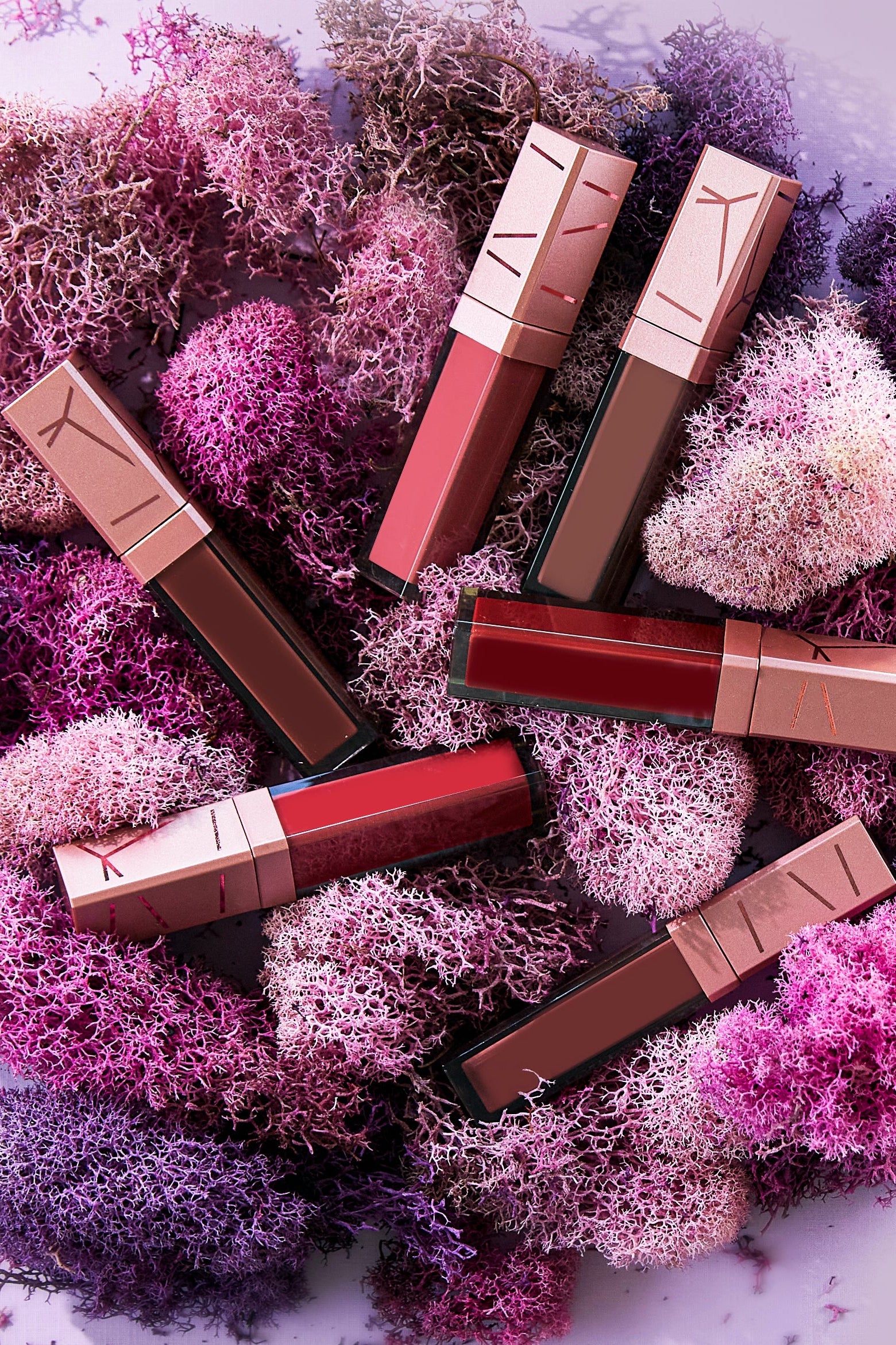 Editorial product image of the different Radiant Ruby Lip Creme shade options.