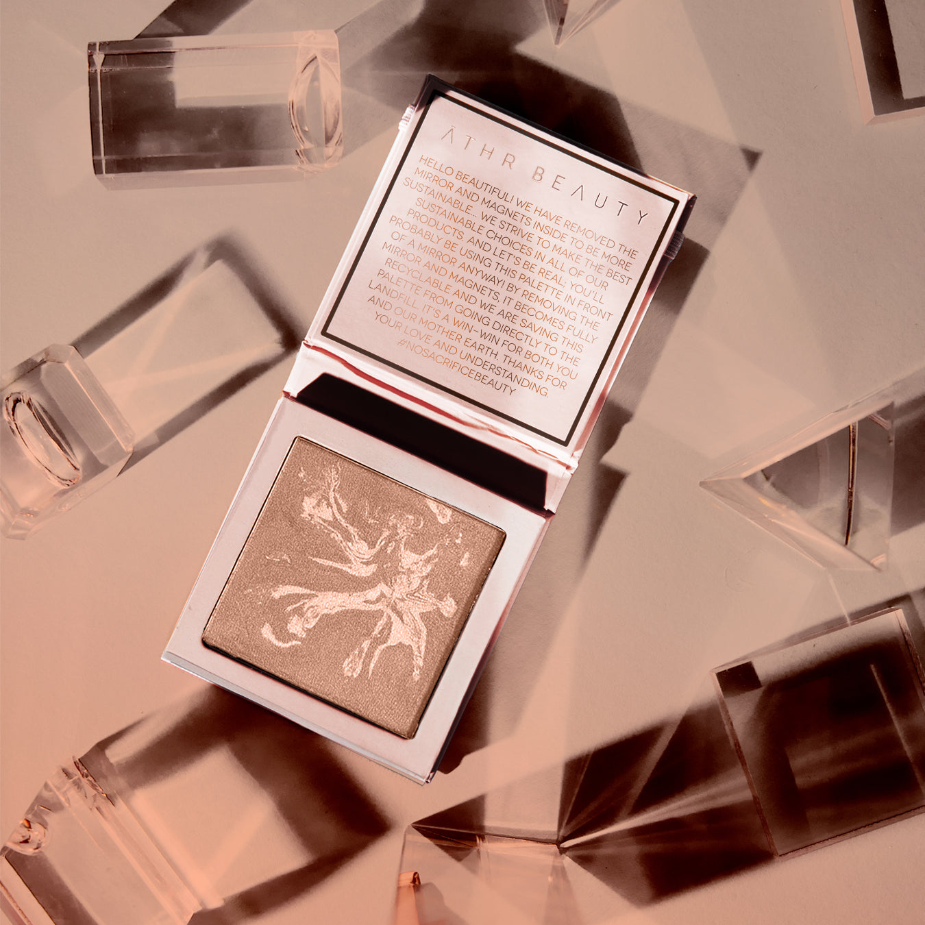 Editorial product image of the 1-Pan "Aurora" Diffused Reflections Bronzing Powder, sitting open to show the shade color.