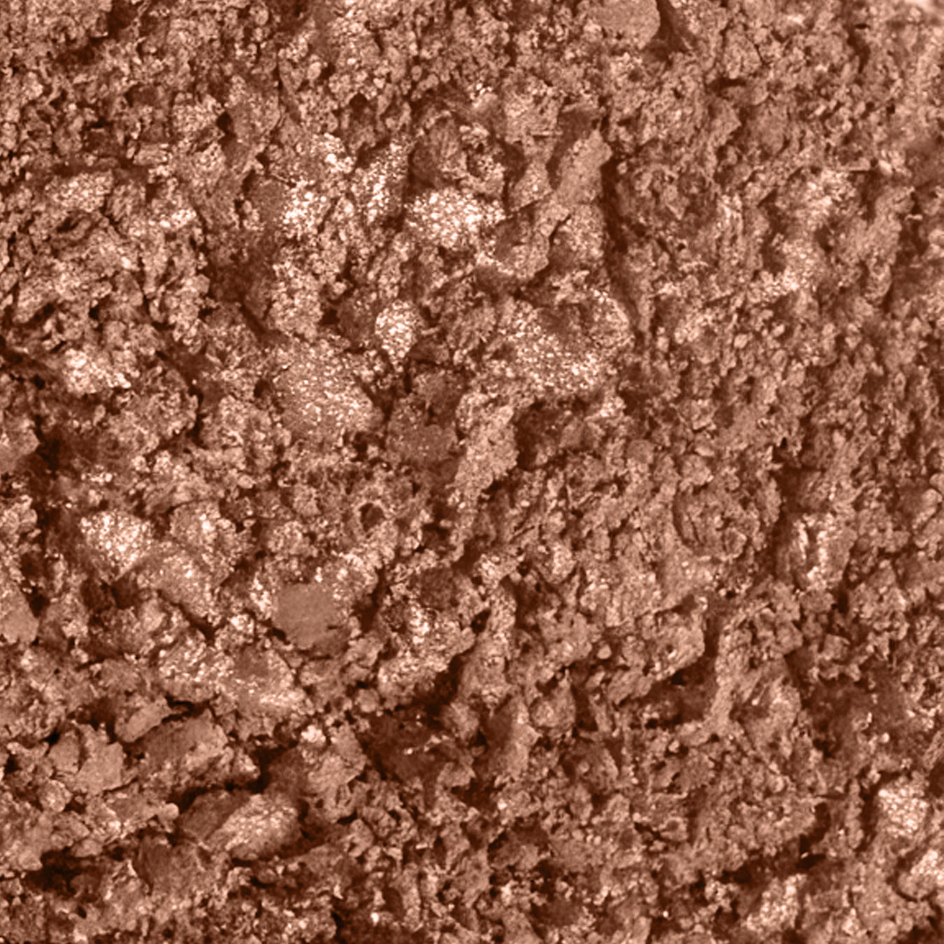 Swatch image of the 1-Pan "Aurora" Diffused Reflections Bronzing Powder, crushed to show the shade color.