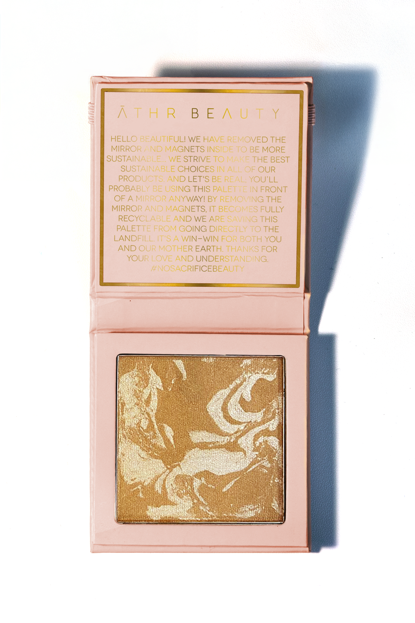 Studio product image of the 1-Pan "Ethereal" Diffused Reflections Bronzing Powder, sitting open to show the shade color.