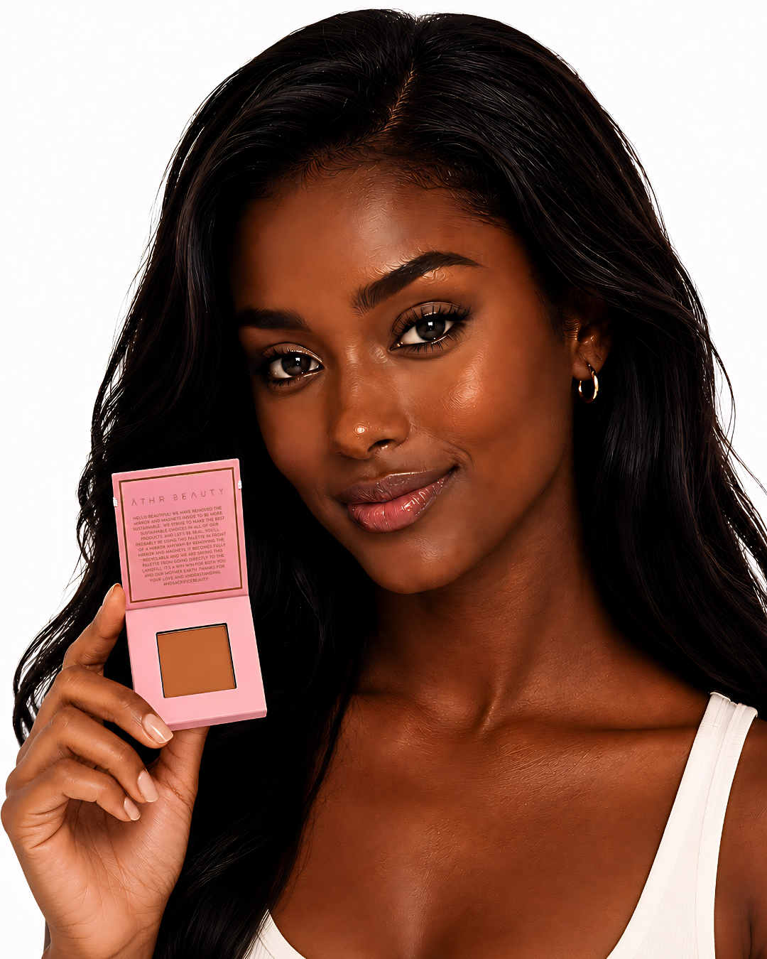 Woman holding a pink compact with a brown powder