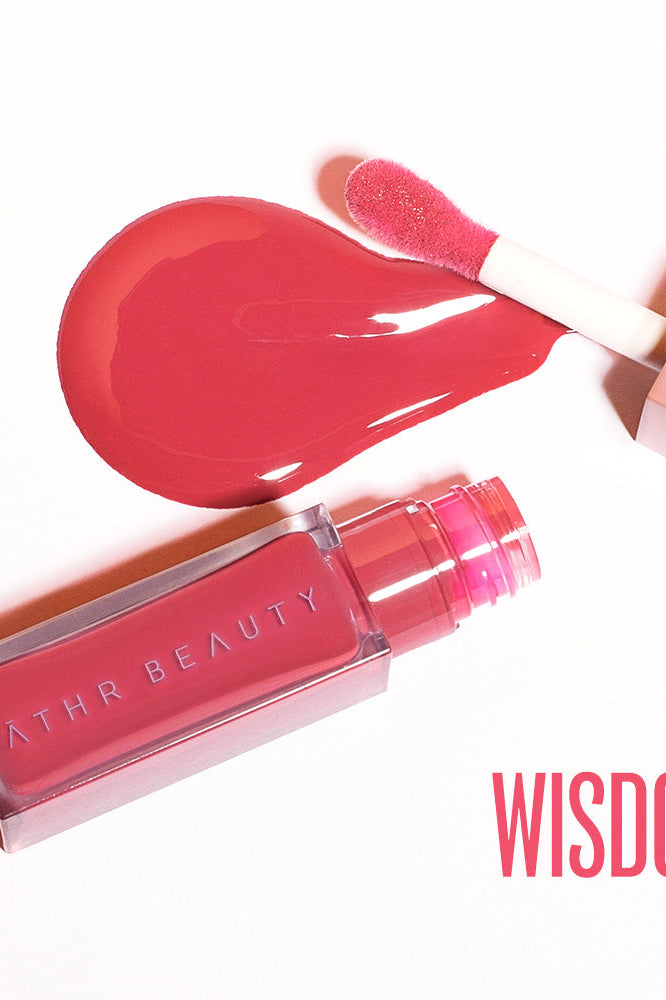 Flat lay product image of the Desert Rose Lip + Cheek Oil Stain in the peachy-coral shade "Wisdom".