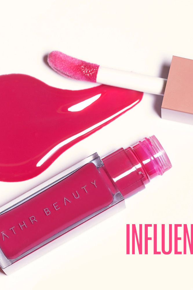 Flat lay product image of the Desert Rose Lip + Cheek Oil Stain in the hot pink shade "Influence".
