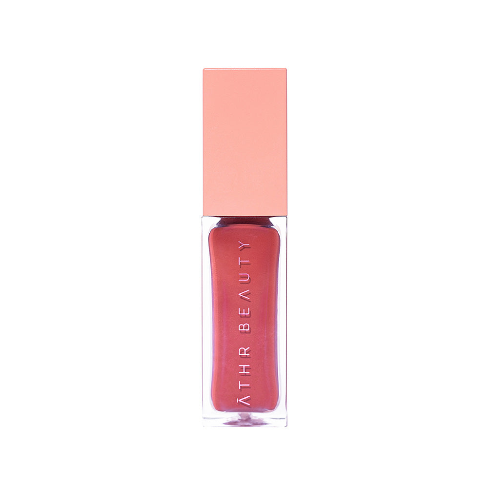 Studio product image of the Desert Rose Lip + Cheek Oil Stain in the light peach-tone shade "Harmony".
