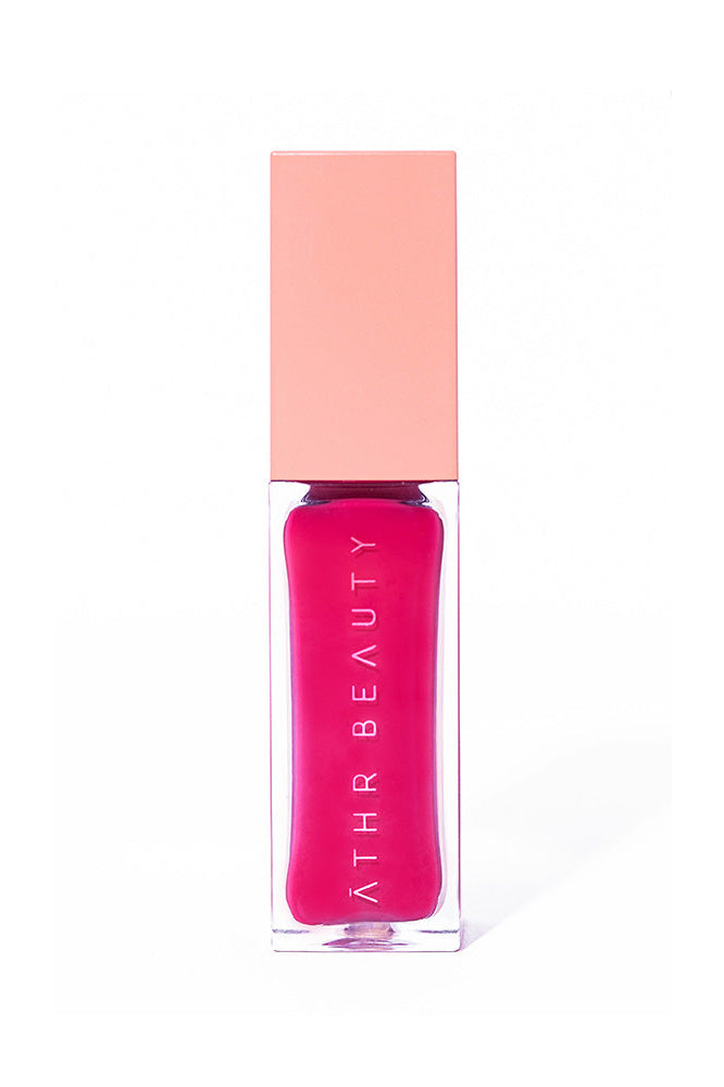 Studio product image of the Desert Rose Lip + Cheek Oil Stain in the hot pink shade "Influence".