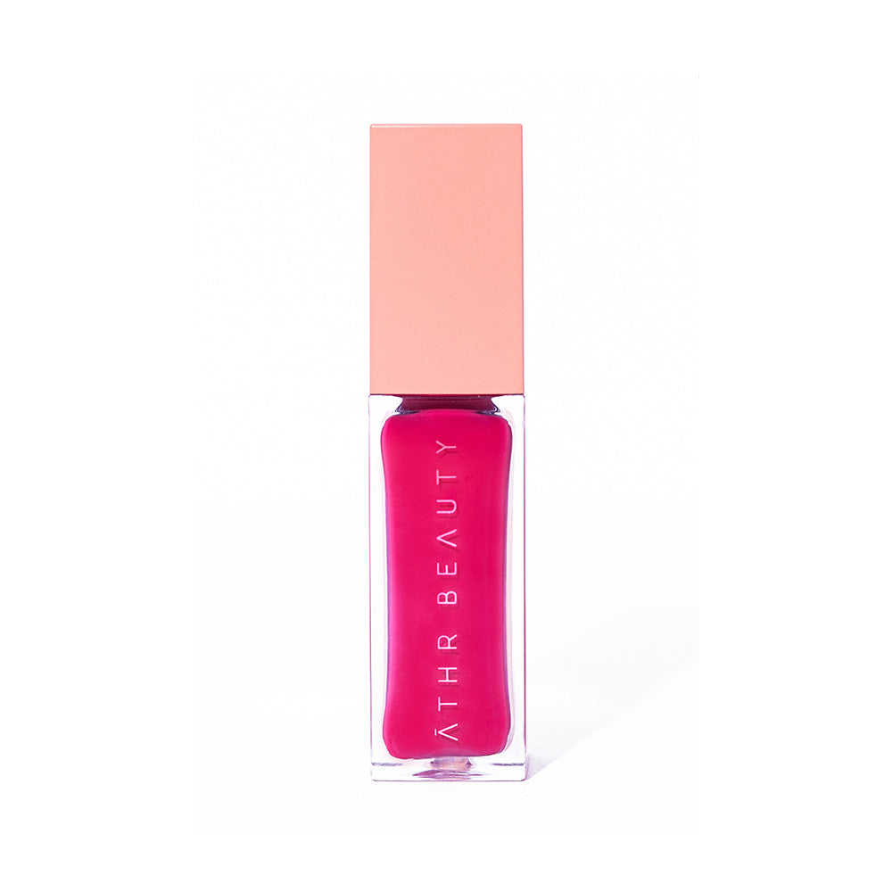 Studio product image of the Desert Rose Lip + Cheek Oil Stain in the hot pink shade "Influence".