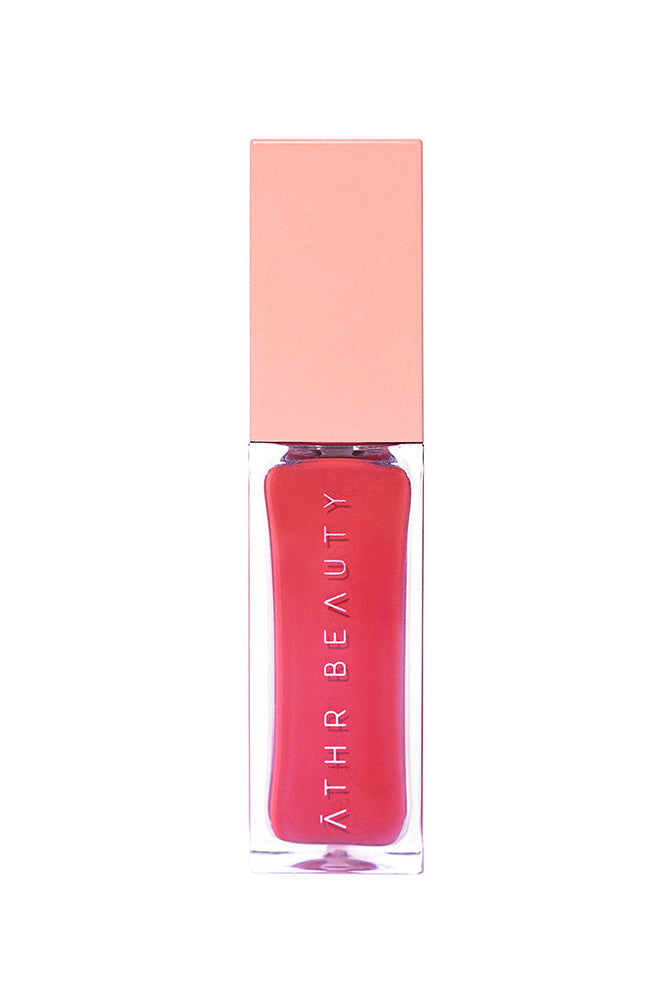 Studio product image of the Desert Rose Lip + Cheek Oil Stain in the peachy-coral shade "Wisdom".