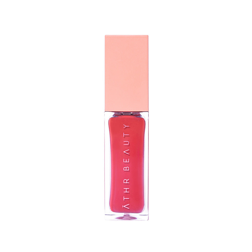 Studio product image of the Desert Rose Lip + Cheek Oil Stain in the peachy-coral shade "Wisdom".
