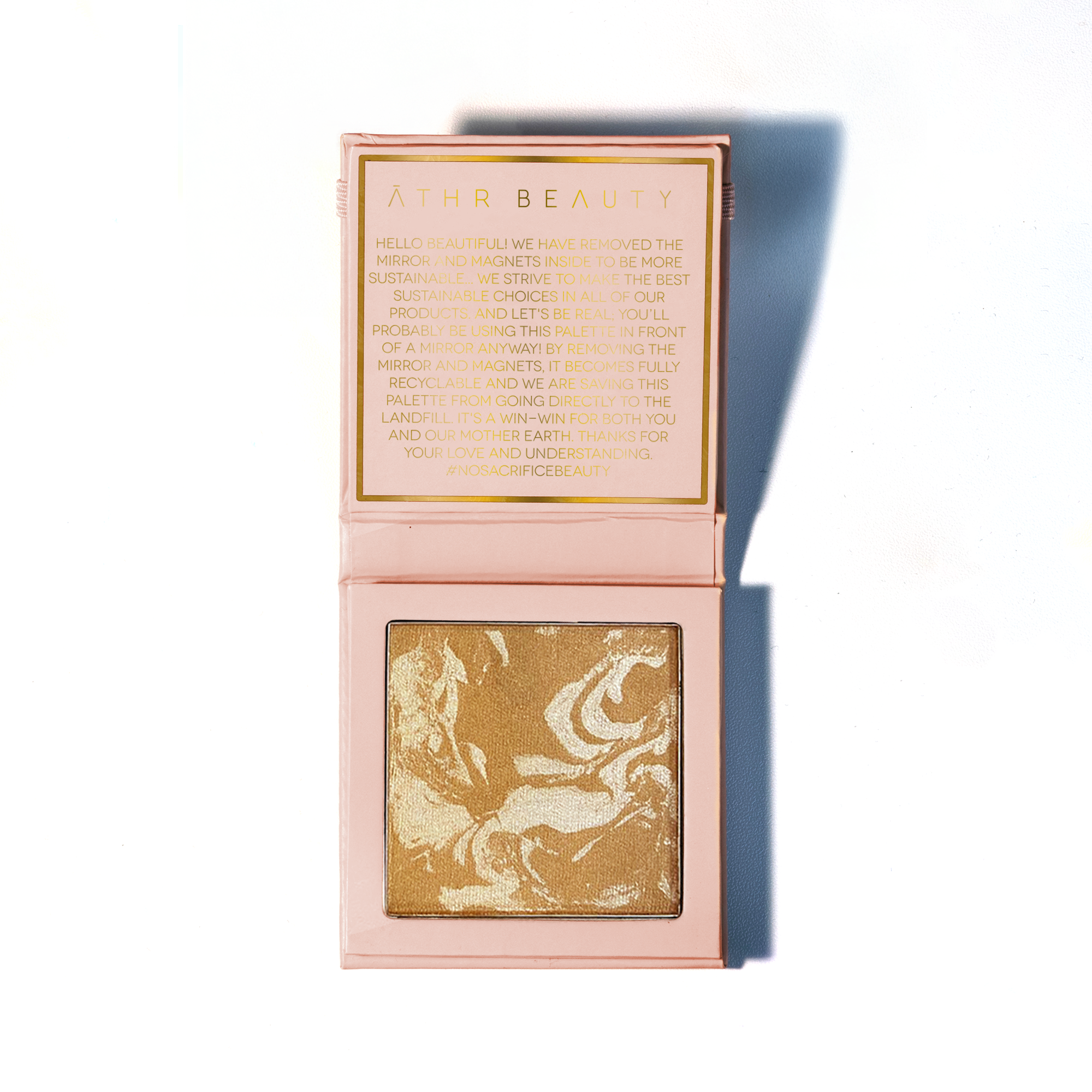 Studio product image of the 1-Pan "Ethereal" Diffused Reflections Bronzing Powder, sitting open to show the shade color.