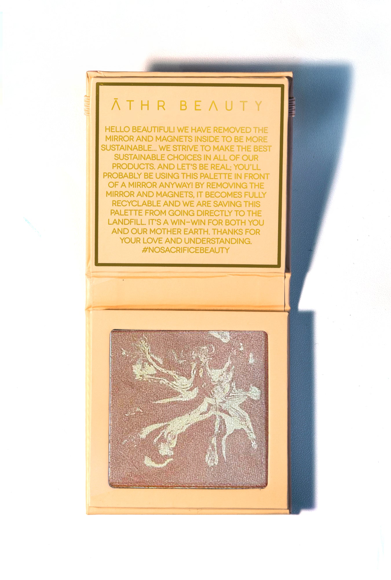 Studio product image of the 1-Pan "Ethereal" Diffused Reflections Bronzing Powder, sitting open to show the shade color.