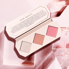 Editorial product image of the 3-Pan "Rose Quartz" Crystal Charged Cheek Palette, sitting open to show the shade color.