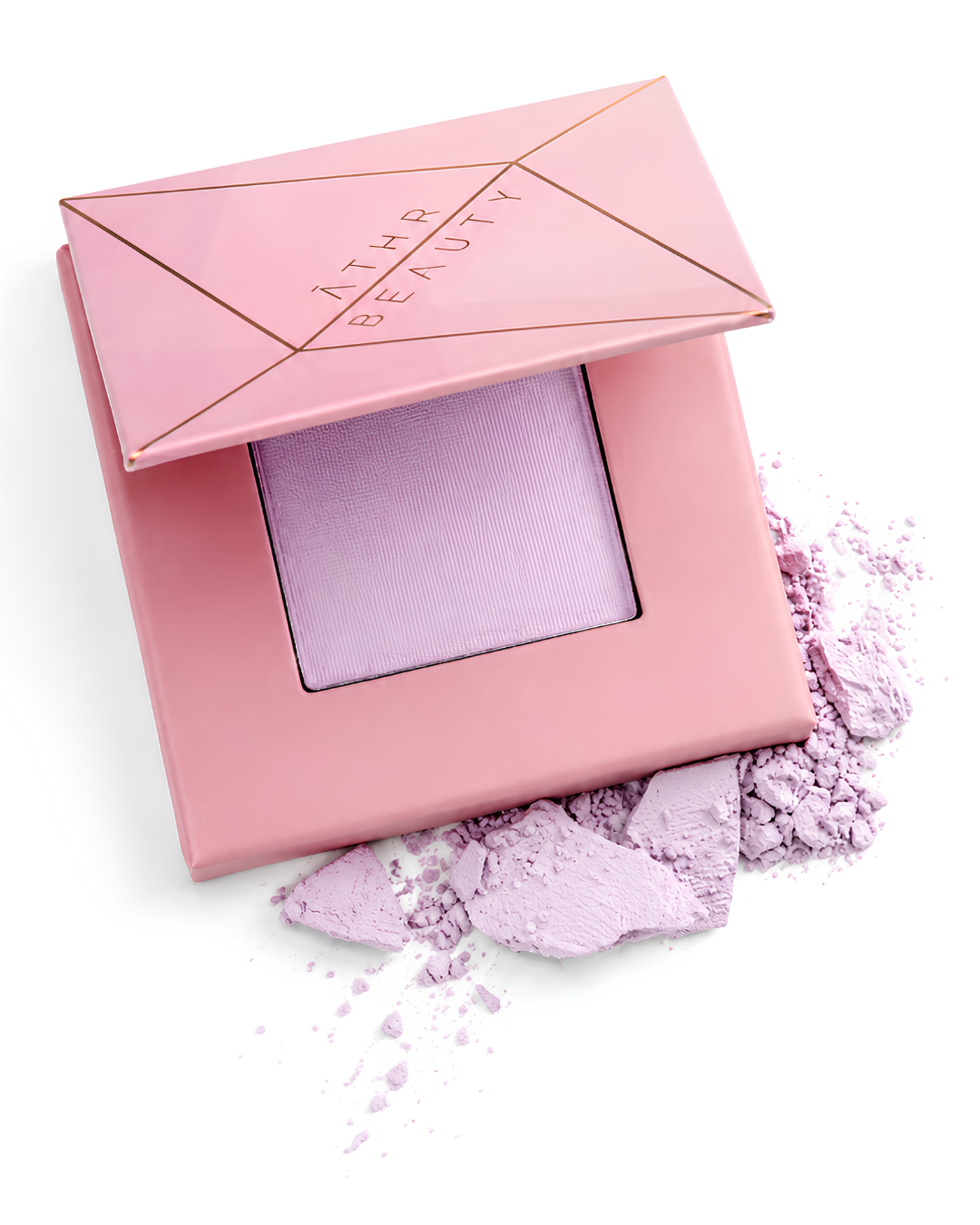 Pink makeup compact with lavender powder on a white background
