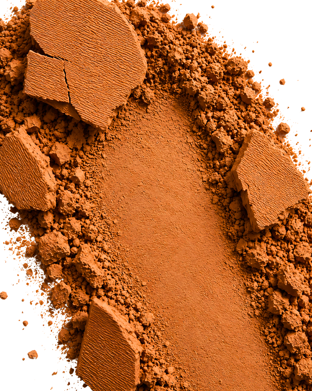 Close-up of brown makeup powder with a pressed powder compact on a white background