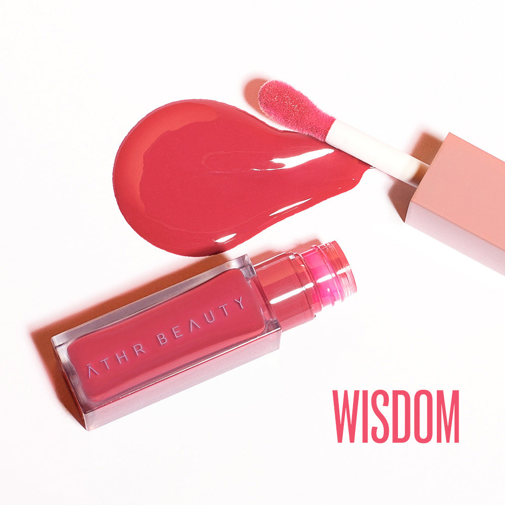 Flat lay product image of the Desert Rose Lip + Cheek Oil Stain in the peachy-coral shade "Wisdom".